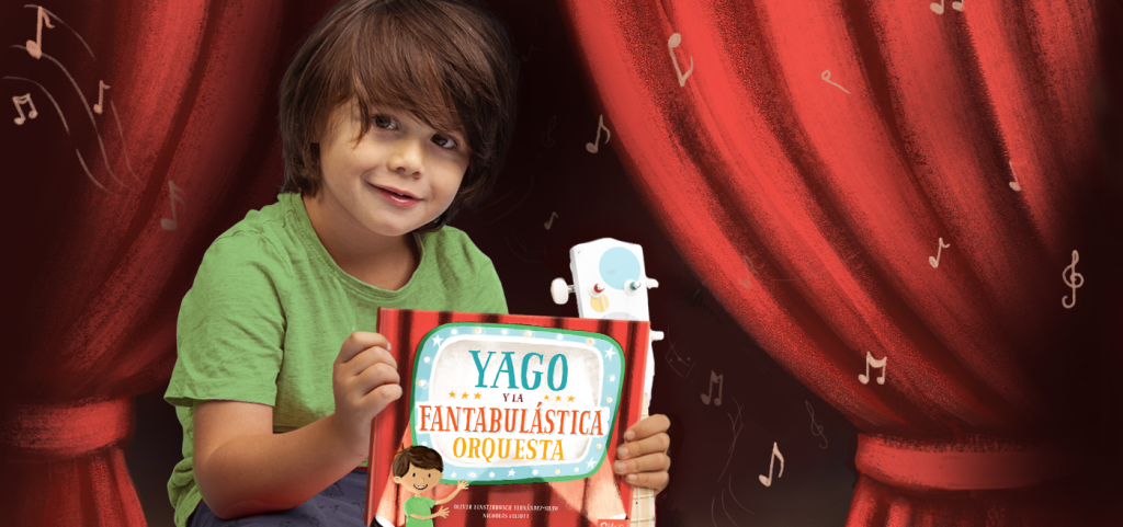 Un niño con la portada de Mi fantabulástica orquesta