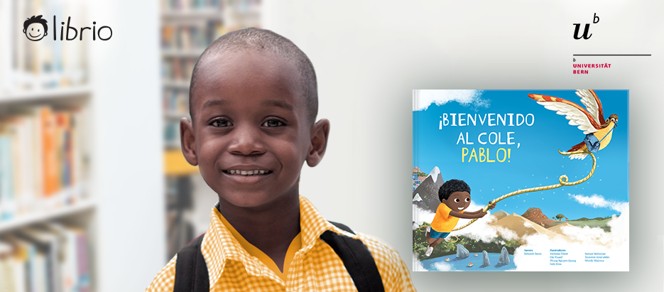 Niño de color con portada del libro Bienvenidos al cole