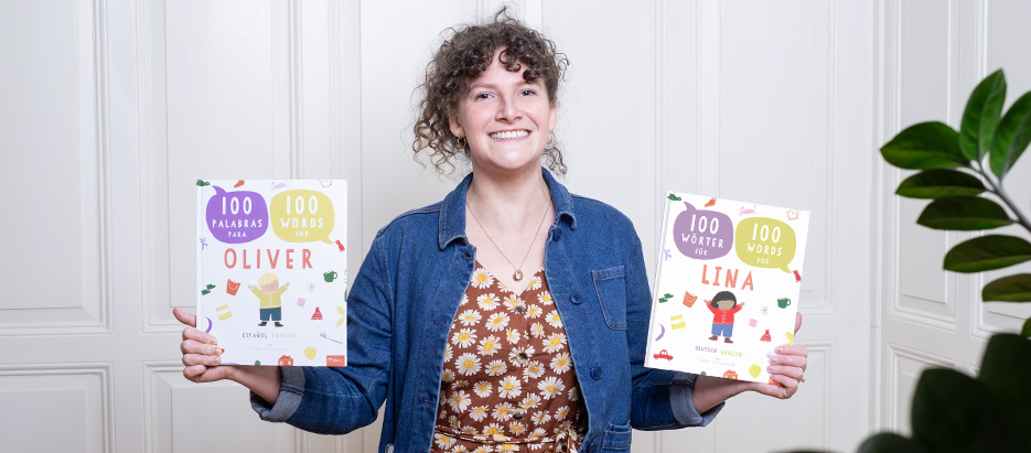 Kerry with her two books (bilingual and monolingual picture dictionaries)